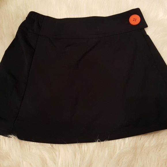 runin Dresses & Skirts - BLACK RUNIN WRAP TENNIS OR RUNNING SKIRT